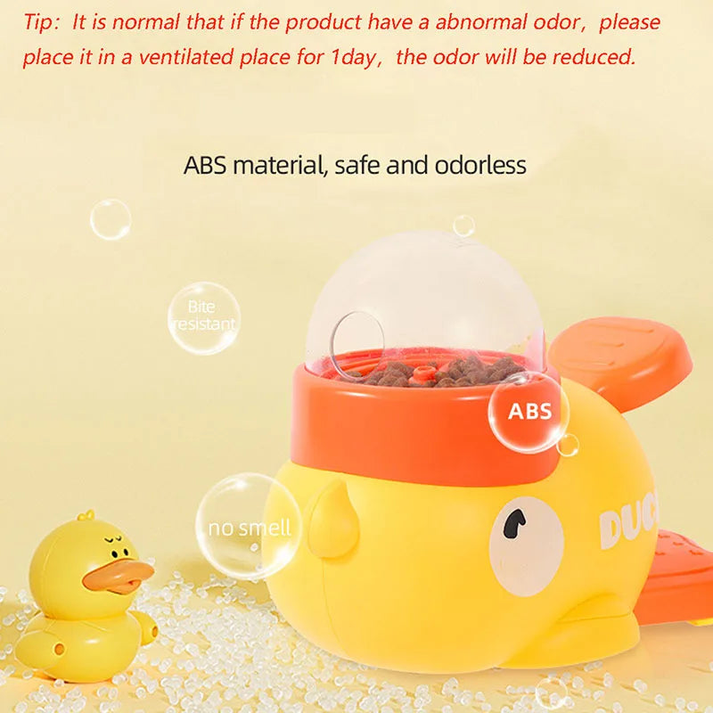 Yellow duck-shaped press treat dispenser toy for pets